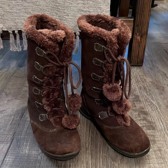 Ladies brown suede, mid-calf lace up boots with fun decorative pom